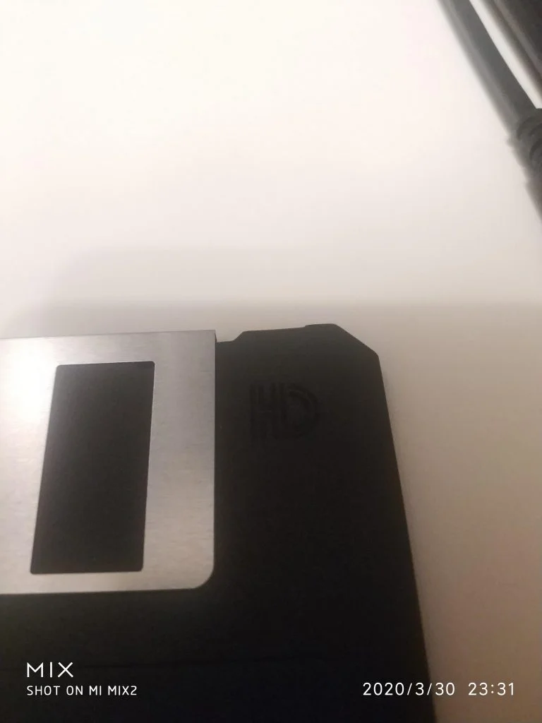 Someone knows what is this logo printed on floppy disks? 15 Someone knows what is this logo printed on floppy disks? 15